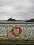 SX09938-9 Life buoy on Mumbles pier and Mumbles Head Lighthouse copy.jpg